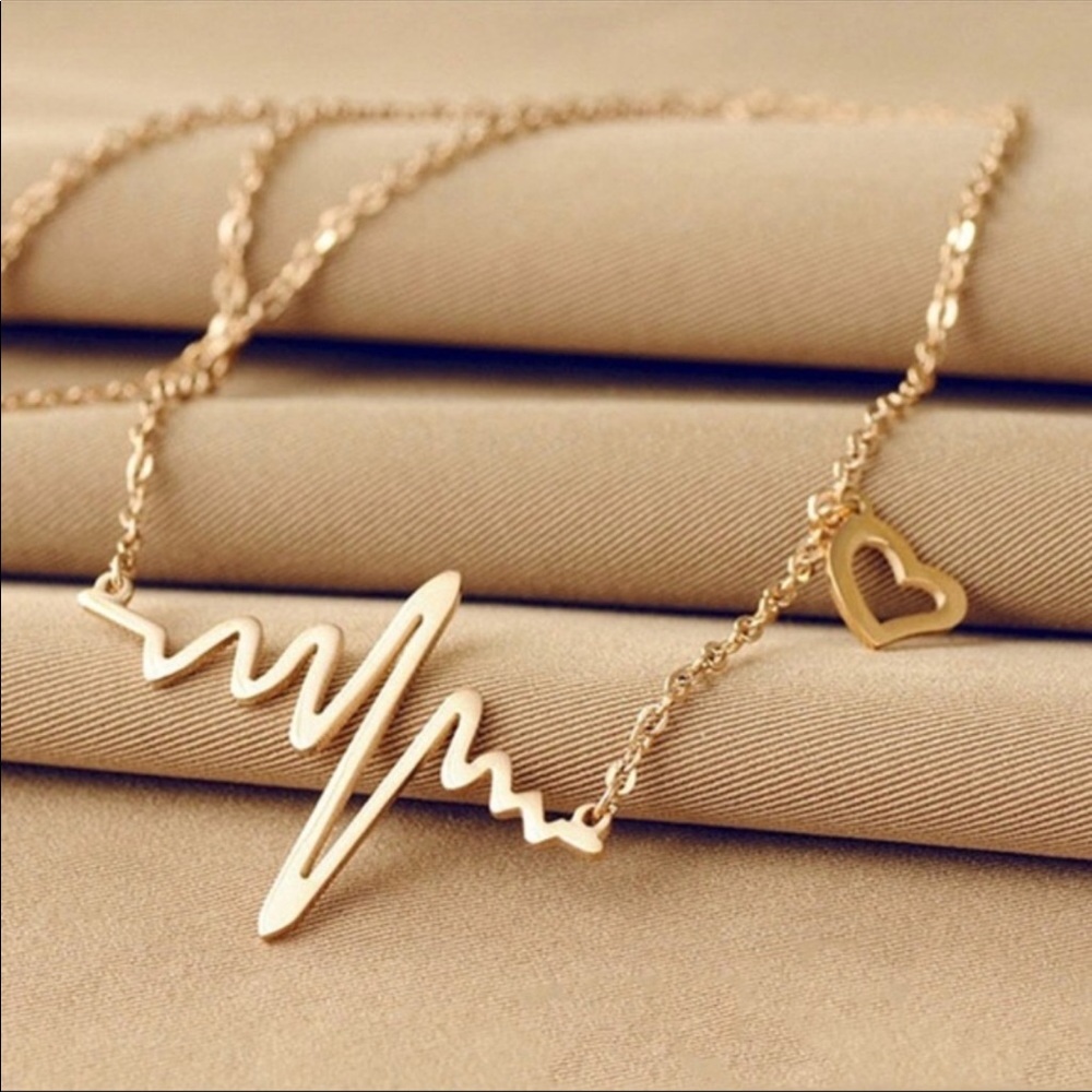 Heart beat gold necklace